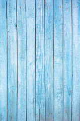 Fototapeta na wymiar Bright blue wooden plank background