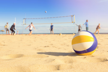 group of friends playing beach volleyball - Powered by Adobe