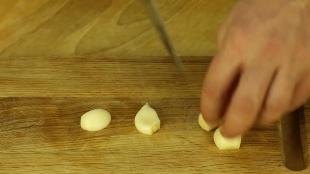 Cutting garlic cloves