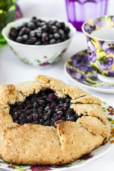 crusty pie or galette with blueberries