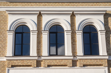 Naklejka premium The window in the building. Three windows.