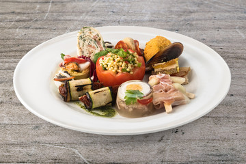Mixed appetizers with meat, egg and vegetables