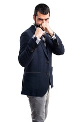 Fototapeta premium Handsome man giving a punch