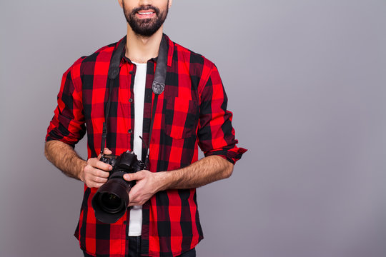 Close Up Photo Of Young Successful Cameraman Holding Camera