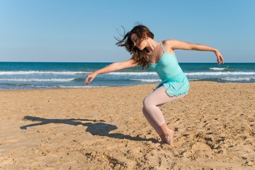 Fototapeta na wymiar Teenager girl dancing outdoor