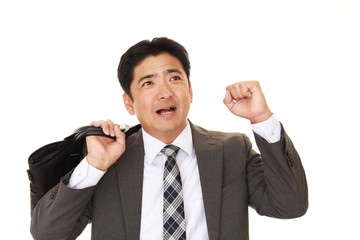 ガッツポーズのビジネスマン