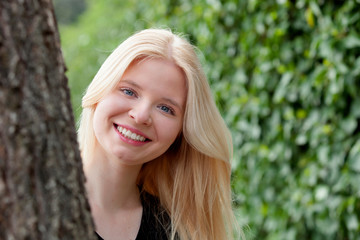 Cool blonde girl surrounded by nature