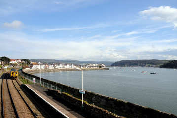 Fototapeta premium Train Approaching Deganwy Railway Station