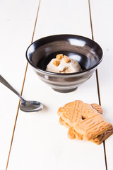 hazelnut ice cream topped with ginger cookie