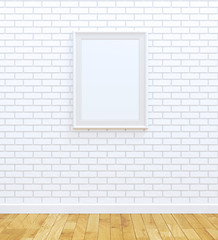 Blank white picture frame on white brick wall