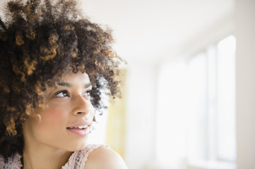 Mixed race woman looking up