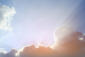 Fototapeta na wymiar light rays of sun on clear blue sky background