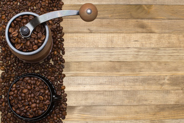 Fototapeta premium coffee mill and strip coffee beans