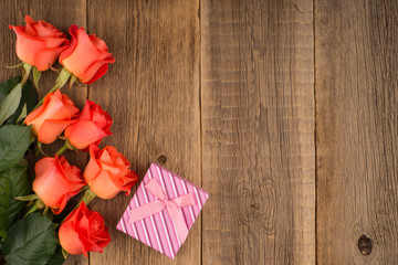 Fototapeta na wymiar rose on wooden background