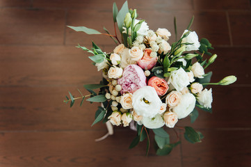 beautiful modern wedding bouquet on wooden planks