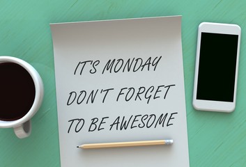 Its Monday Dont Forget To Be Awesome, message on paper, smart phone and coffee on table, 3D rendering