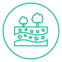 Cut of soil with different layers and trees on top line icon.