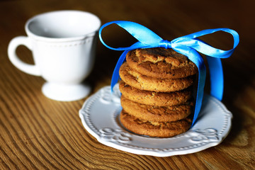 cookies with ribbon on plate