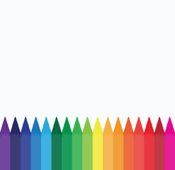Crayons lined up in rainbow isolated on white background.