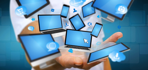 Businessman connecting tech device with his finger