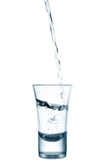 pouring water into glass