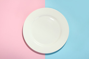 large round platter in pink and blue background