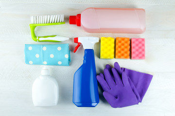 set detergents neatly stacked on white wooden background
