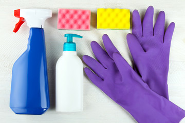 set detergents neatly stacked on white wooden background