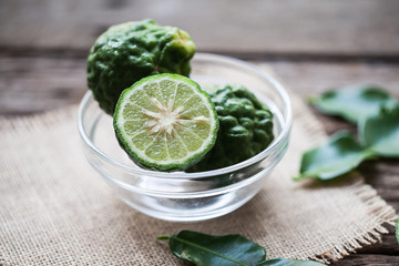 bergamot on sackcloth and wooden background