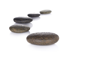 Row pebbles with copy space on white background