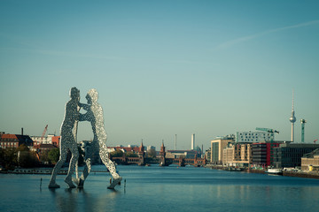 The Molecule Man sculpture on the Spree in Berlin, Germany