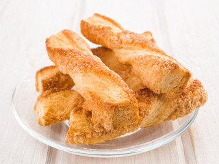 Twisted pastry on white wooden