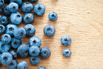 Blueberries on wooden background. Close up, top view, high resolution product. Harvest Concept