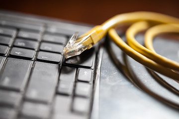 Network cable on computer keyboard