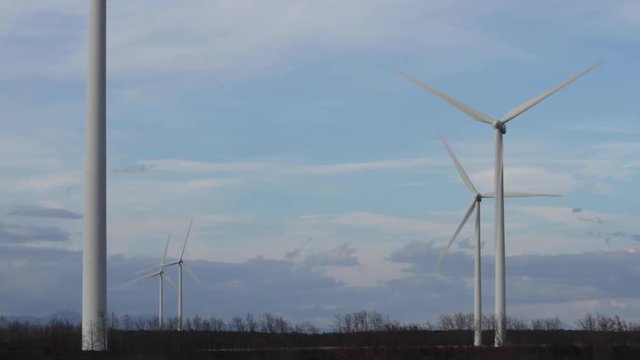Wind Turbines with Rotating Blades