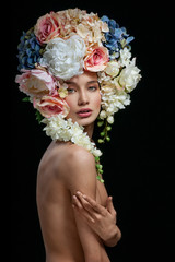 Beautiful woman with flowers in her hair. Bouquet of Beautiful F