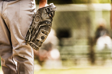 Baseball player wearing baseball glove