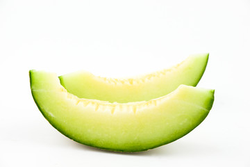 Pieces of melon white background 