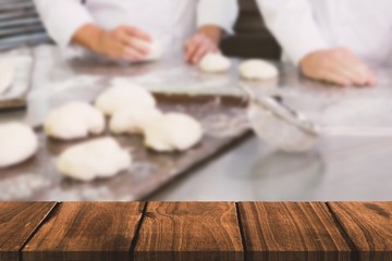 Composite image of wooden table