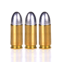 9mm lead round nose bullet on white background