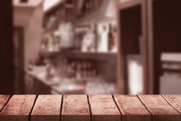Composite image of alcohol bottles arranged in a shelf