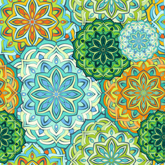 Fototapeta na wymiar Seamless pattern with colorful mandala. Figure in the oriental style with traditional elements.
