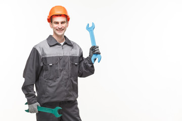 Fototapeta na wymiar man holding wrench isolated on white background