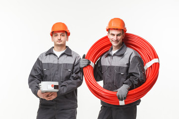 duo of plumbers isolated on white