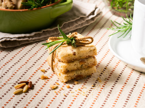 Home made cookies with rosemary and pignoli nuts