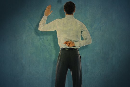 Composite Image Of Businessman Crossing Fingers Behind His Back