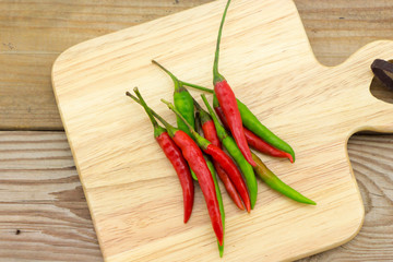 Chilli on wooden plate 