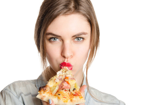 Pretty Young Sexy Woman Eating Big Slice Of Pizza Standing On White Background