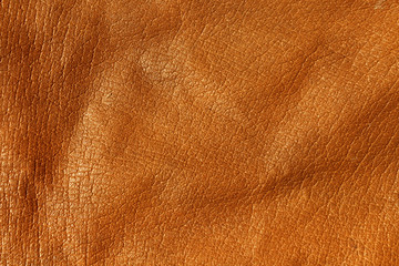 Orange leather texture.