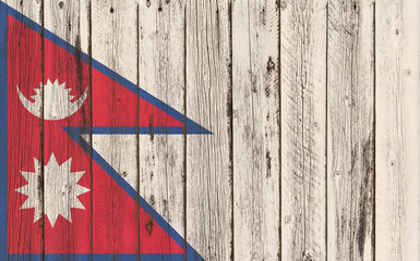 Flag of Nepal painted on wooden frame